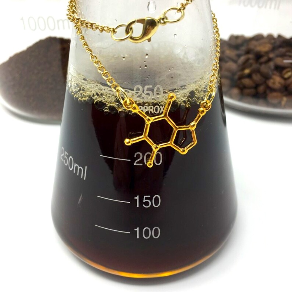 Rose gold plated caffeine molecule necklace. Sold at Boxlunch and other stores